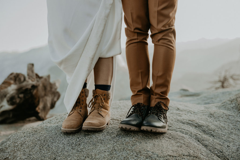 hiking boots on a bride and groom in Yosemite National Park