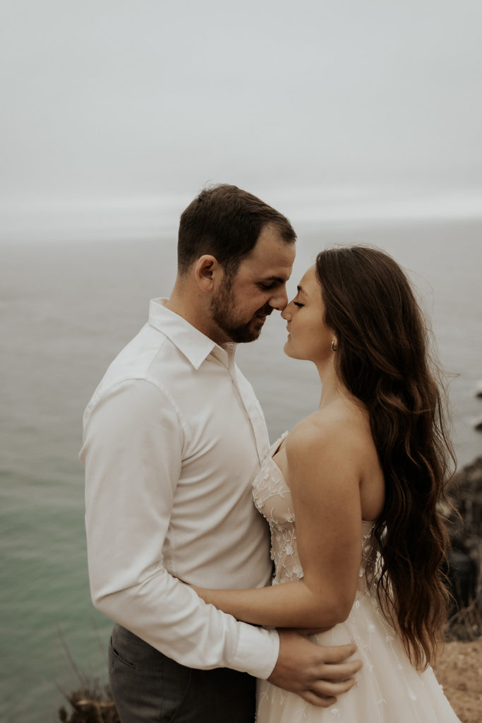 Bride and Groom holding each other at Big Sur